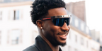 Basketball player Jaren Jackson Jr. was seen wearing black Prada Linea Rossa SPS 01Y 1BO06F sunglasses during Paris Men's Fashion Week season Spring/Summer 2024.