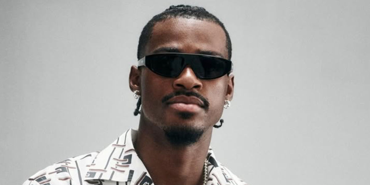 Basketball player Jarred Vanderbilt of the Los Angeles Lakers was seen wearing black Prada PR C02S 16K08Z sunglasses at the Prada Menswear Spring/Summer 2027 fashion show during Milan Men's Fashion Week.