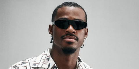 Basketball player Jarred Vanderbilt of the Los Angeles Lakers was seen wearing black Prada PR C02S 16K08Z sunglasses at the Prada Menswear Spring/Summer 2027 fashion show during Milan Men's Fashion Week.