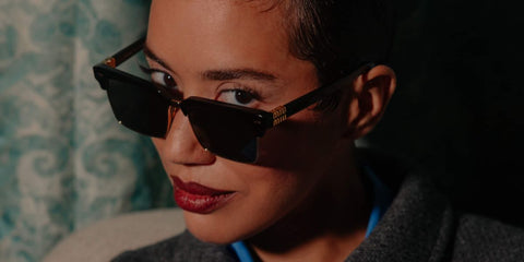 Actress Jasmin Savoy Brown was seen wearing black Miu Miu MU 10ZS 1AB5S0 alf-rim sunglasses in a The Italian Reve Magazine feature, September 2024. Shop online now on Pretavoir