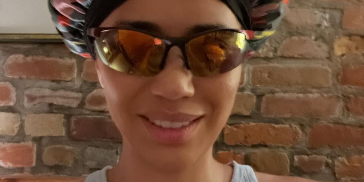 Actress Jasmin Savoy Brown was seen wearing brown Miu Miu MU A02S 16Y8G1 sunglasses with gold mirrored lenses in her Instagram post, September 2025. Shop online now on Pretavoir
