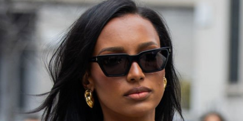 Jasmine Tookes at Max Mara FW24 fashion show at Milan Fashion week wearing black Saint Laurent sunglasses
