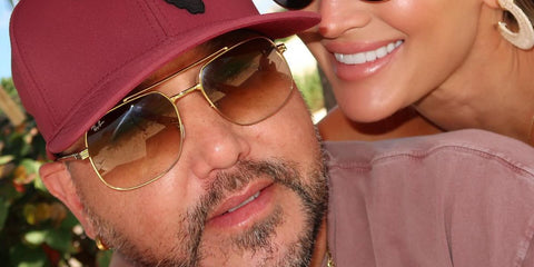 American country singer Jason Aldean was seen wearing gold Ray-Ban RB 3699 001/51 aviator sunglasses with brown gradient lenses in November 2024.