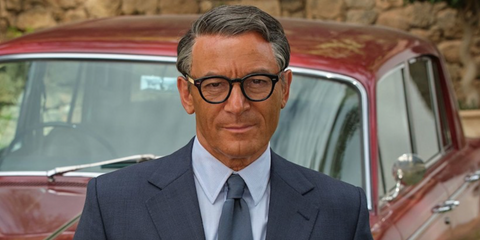 Jason Isaacs was seen wearing black Oliver Peoples Sheldrake OV5036 1492 optical glasses in 2023 series Archie as Cary Grant