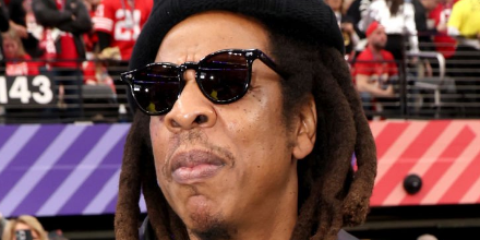 Jay Z wearing sunglasses at the Super Bowl 2024
