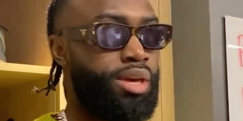 Jaylen Brown is seen wearing Prada PR A01S 18Z40K with havana and animal print frame in an interview