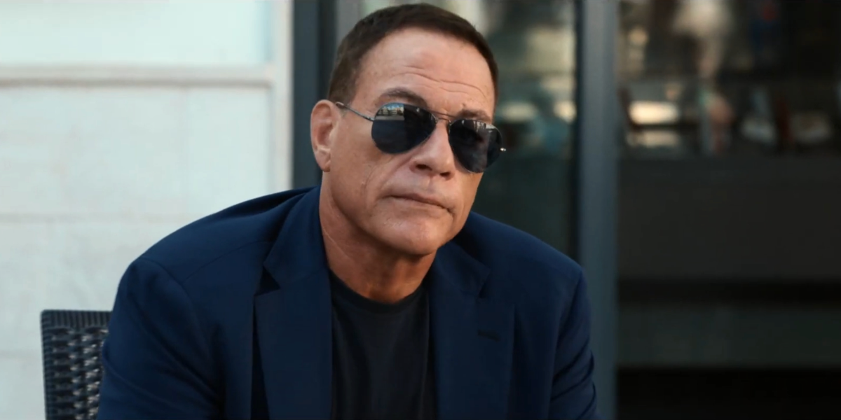 Jean-Claude Van Damme was seen wearing Ray-Ban Aviator Titanium RB 8089 165/S2 Polarised sunglasses with blue lenses in 2024 movie 'Kill Em All 2'