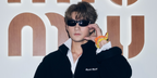 Hong Kong singer and actor Jeffrey Ngai was seen wearing black Miu Miu MU A02S 19Y10K sunglasses at a Miu Miu store event in September 2024.