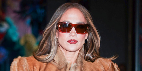 Jennifer Lopez was seen wearing transparent brown Prada PR B18S 28E90Q sunglasses with brown lenses in New York City, May 2026.