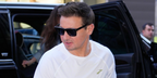 Hawkeye actor Jeremy Renner was seen wearing shiny black Tom Ford Buckley-02 TF906-N 01A square sunglasses with grey smoke lenses outside of "Good Morning America" studios in New York City
