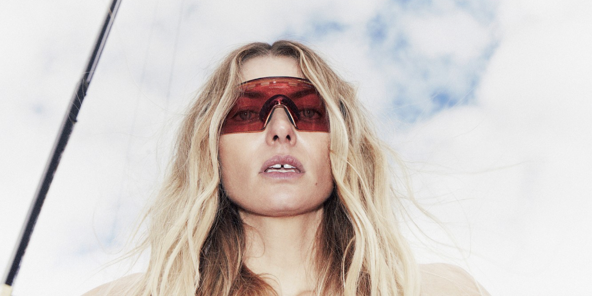 Australian model Jessica Hart was seen wearing Oakley Encoder Strike Vented OO9235 16 Prizm sunglasses in an Harper's Bazaar Australia digital story 2024, photographed by Pierre Toussaint.