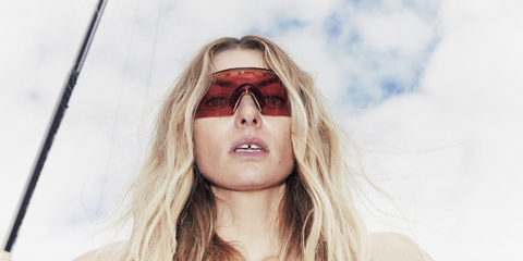 Australian model Jessica Hart was seen wearing Oakley Encoder Strike Vented OO9235 16 Prizm sunglasses in an Harper's Bazaar Australia digital story 2024, photographed by Pierre Toussaint.