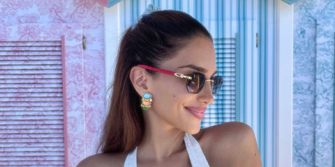 Lebanese-Australian model Jessica Kahawaty was seen wearing hexagonal Cartier CT0439S 003 gold rimless sunglasses with red wood temple in Capri, June 2025. shared on Instagram. Shop online now on Pretavoir