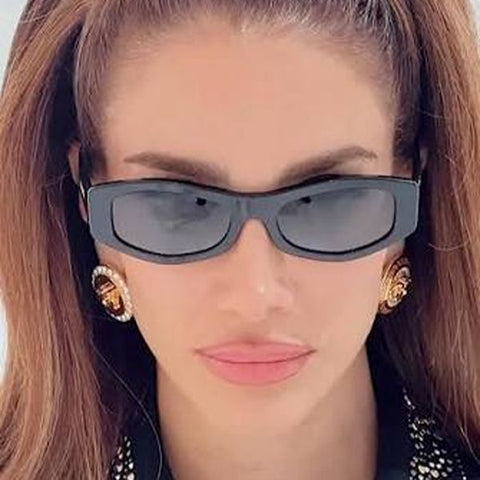 Lebanese-Australian model Jessica Kahawaty was seen wearing black Versace 4487 GB1/87 sunglasses in her Facebook video, November 2025.