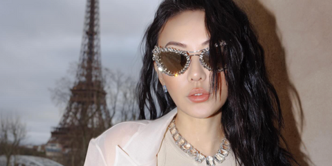 Jessica Wang was seen wearing silver Swarovski SK7011 4001/AP sunglasses with detachable crystal Clip-On Trim during Paris Fashion Week season Fall/Winter 2024. Shop online now on Pretavoir