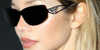 Jessie Andrews was seen wearing black Prada PR 14YS 1AB5S0 rectangular sunglasses with Prada triangle logo on the temple in her social media post