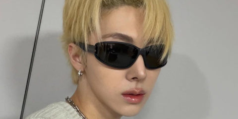 South Korean singer and rapper Jo Woo-chan widely known as Woochan, was seen wearing black Gucci GG2011S 001 sunglasses in his Instagram post, March 2026.