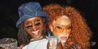 Jodie turner-Smith, pictured with Winnie Harlow, was seen wearing silver Gucci GG1648S 008 rectangular sunglasses at the 2025 Coachella music festival