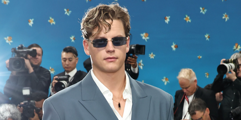 Joe Burrow was seen wearing gold Cartier Panthere CT0430S 001 rimless sunglasses with grey lenses at the 2025 Met Gala