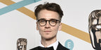 Joe Sugg was seen wearing tortoiseshell Garrett Leight Winward 1050 SPBRNSH optical glasses to attend the 2024 BAFTA Awards