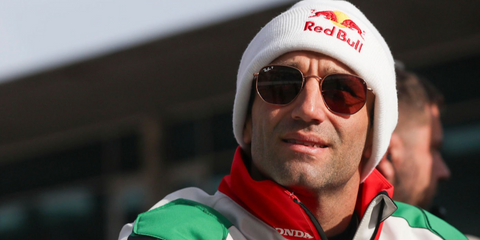 French Grand Prix motorcycle racer Johann Zarco was seen wearing gold Ray-Ban Hexagonal RB 3548N 9202/AF Polarised sunglasses at the MotoGP of Portugal 2025.