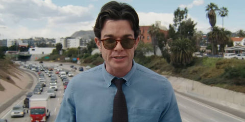 John Mulaney is seen wearing Garrett Leight Bentley 2036 SPBRNSH/GRN sunglasses in 'Everybody's in L.A.'