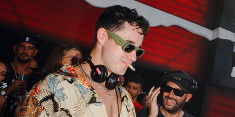 John Summit is seen wearing green Prada PR 17WS 13N5S0 sunglasses in Ibiza