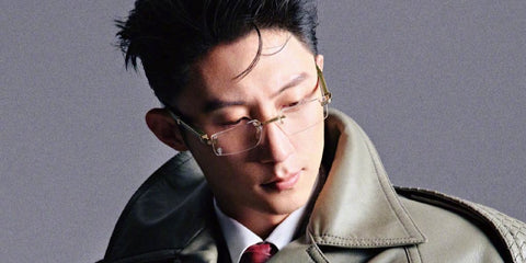 Chinese actor and model Huang Jingyu, widely known as Johnny Huang, was seen wearing gold and green wood Cartier CT0485O 006 optical glasses in a L'Officiel China feature, April 2026.