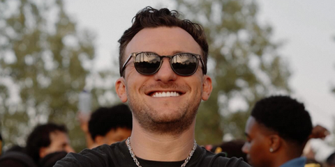 American football quarterback Johnny Manziel was seen wearing black Oliver Peoples Finley Esq. Sun U OV5298SU 1492/P2 Polarised sunglasses in his Instagram post, August 2025.