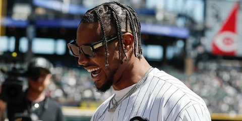 American football player Jonathan Owens of Indianapolis Colts (then Chicago Bears) was seen wearing black Saint Laurent SL 572 001 sunglasses in his Instagram post, April 2024.