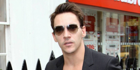 Irish actor Jonathan Rhys Meyers was seen wearing ruthenium Ray-Ban Aviator 3025 004/51 Grey/Brown Gradient sunglasses in 2010