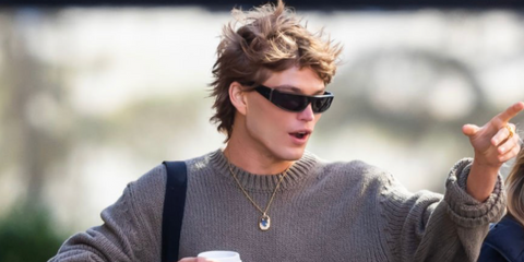 Australian model Jordan Barrett was seen wearing shiny black Gucci GG1492S 007 wraparound sunglasses in New York City, March 2023. Shop online now on Pretavoir