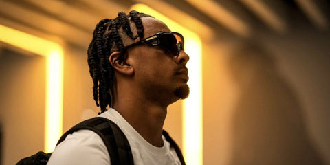 American football player Jordan Love of Geeen Bay Packers was seen wearing black Oakley Latch Panel OO9404 01 Prizm sunglasses, photographed by Evan Siegle in July 2024.
