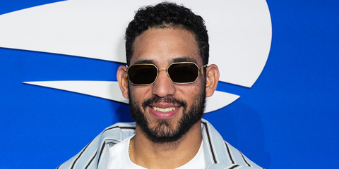 Baseball player Jose Caballero of the New York Yankees was seen wearing gold Prada PR A51S 15N01T geometric sunglasses at the US Open 2026.