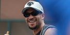 Basketball player Josh Hart was seen wearing black Bottega Veneta BV1406S 001 sunglasses at the New York Knicks Championship Parade & Ceremony celebrating 2026 NBA finals.
