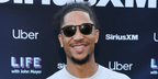 Basketball player Josh Hart of the New York Knicks was seen wearing black Giorgio Armani AR8186U 5001/2A sunglasses at John Mayer's live performance in New York City, August 2026.