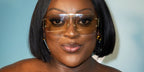 Stand up comedian Judi Love was seen wearing gold Bottega Veneta BV1065S 005 sunglasses with yellow lenses at the London premiere of "Big Man" in June 2025. Shop online now on Pretavoir
