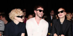 Julia Garner (far left) is seen wearing Gucci GG1704S 001 cat eye sunglasses to attend the brand's Spring/Summer 2024 fashion show in Milan