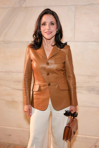 Julia Louis-Dreyfus was seen carrying black Ralph Lauren RL8201 5001/8G sunglasses to attend the Ralph Lauren Fall/Winter 2025 fashion show in New York City, April 2025