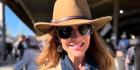 Actress Julie Benz was seen wearing gold Ray-Ban Caravan RB 3136 181 sunglasses in her Instagram post, March 2025.