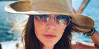 Actress Julie Benz was seen wearing gold Ray-Ban Jack RB 3565 001/51 sunglasses with brown gradient lenses in her Instagram post, December 2022.