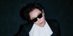 South Korean musician and composer Jung Jae-hyung was seen wearing black Alexander McQueen AM0536S 001 sunglasses in an Allure Korea feature, January 2026.