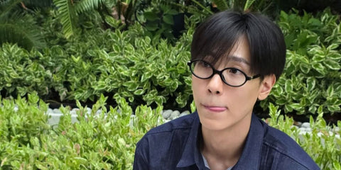 Thai actor Junior Panachai Sriariyarungruang was seen wearing black Miu Miu MU 01XV 1AB1O1 oval optical glasses in his Instagram post, August 2025. Shop online now on Pretavoir