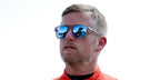 Professional stock car racing driver Justin Allgaier was seen wearing matte grey Oakley Latch Beta OO9436 06 sunglasses with sapphire Prizm Polarised lenses during qualifying for the NASCAR Xfinity Series Nu Way 200 Sauced by Blues Hog  in Illinois, September 2025.