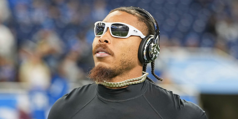 American football player Justin Jefferson of the Minnesota Vikings was seen wearing white Oakley Masseter OO9486 03 Prizm sunglasses before a game against the Detroit Lions, November 2025.