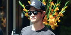 KJ Apa was seen wearing black Ray-Ban Justin 4165  Black/Silver Mirror 622/6G sunglasses after hitting the gym