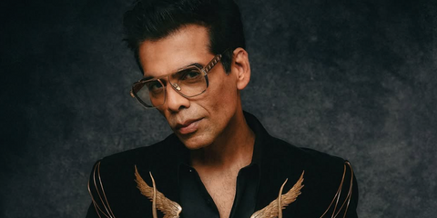 Indian filmmaker and TV personality Karan Johar was seen wearing black and gold Balmain Premier BPS-155A sunglasses with adjusted lenses to attend the 2025 Vanity Fair Oscar Party