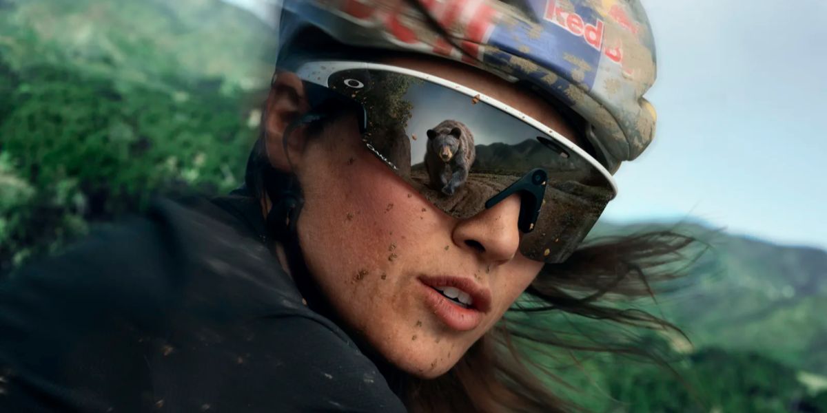 Professional cyclist Kate Courtney was seen wearing white Oakley Meta Vanguard OW8001 05 Prizm Smart Glasses n Oakley Super Bowl 2026 campaign.