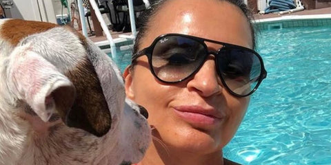 Actress Kathrine Narducci was seen wearing black Ray-Ban Cats 5000 RB 4125 601/32 aviator sunglasses in a social media post.