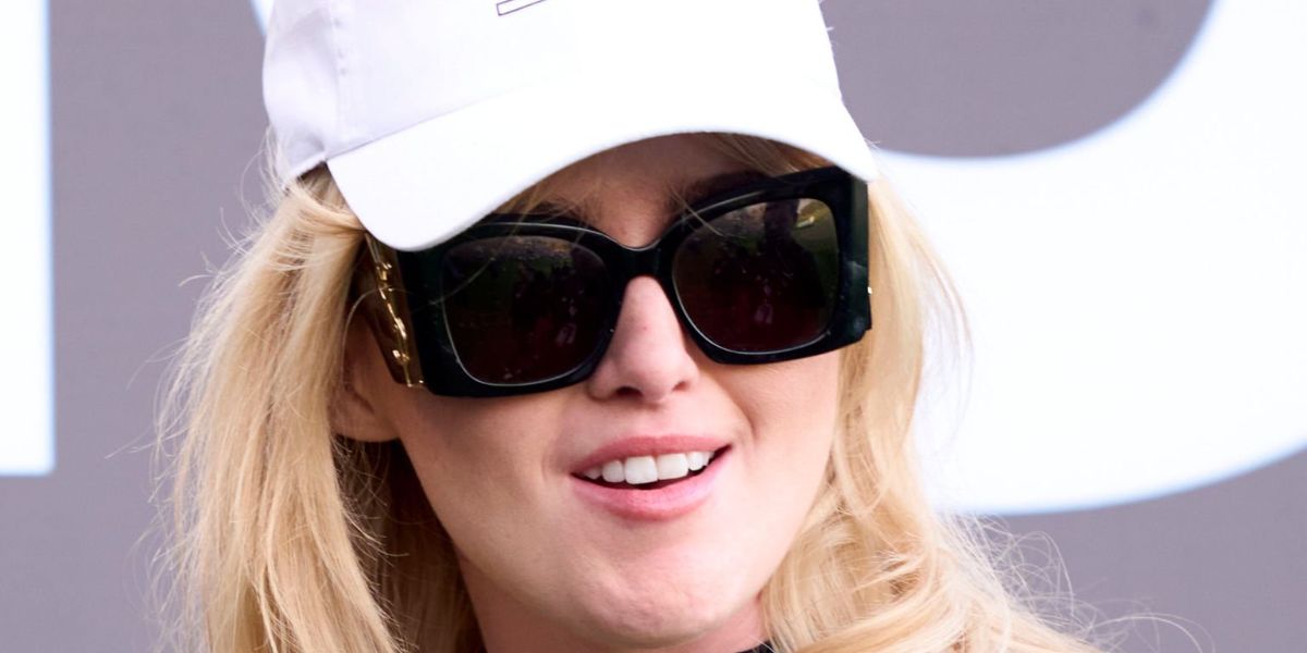 Kathryn Newton was seen wearing black Saint Laurent Sun Blaze SL M119 001 sunglasses at the Hero Dubai Desert Classic, Emirates Golf Club